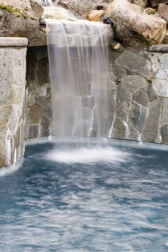 swimming pool with waterfalls ideas 21